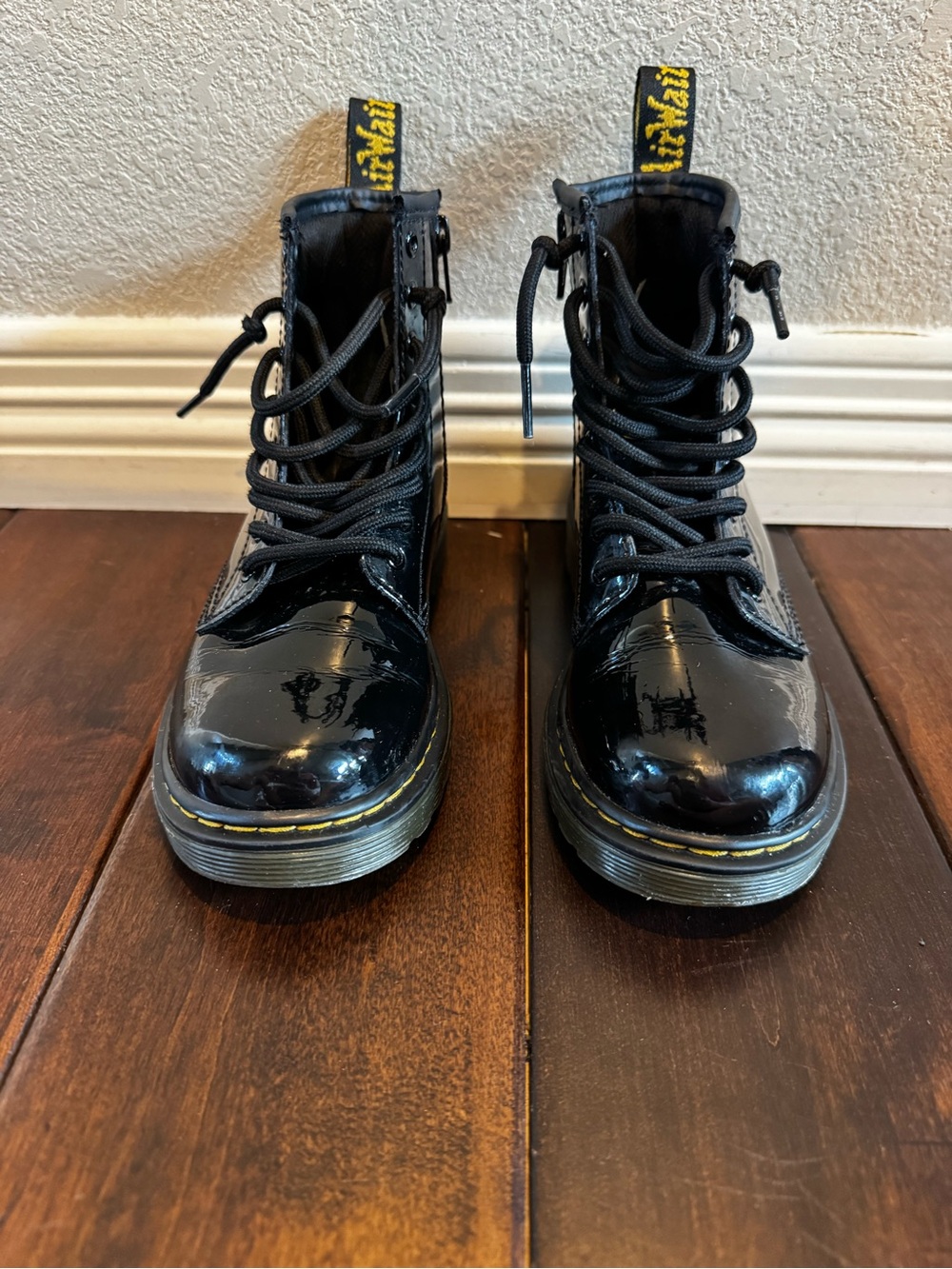 Dr. Martens Kids Black Patent Leather Lace-Up Boots with Yellow Stitching